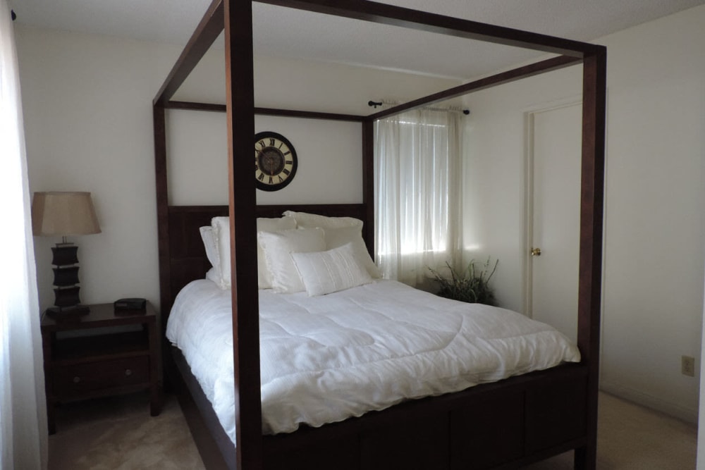 Model bedroom at Peppertree Place Apartments in Riverside, California