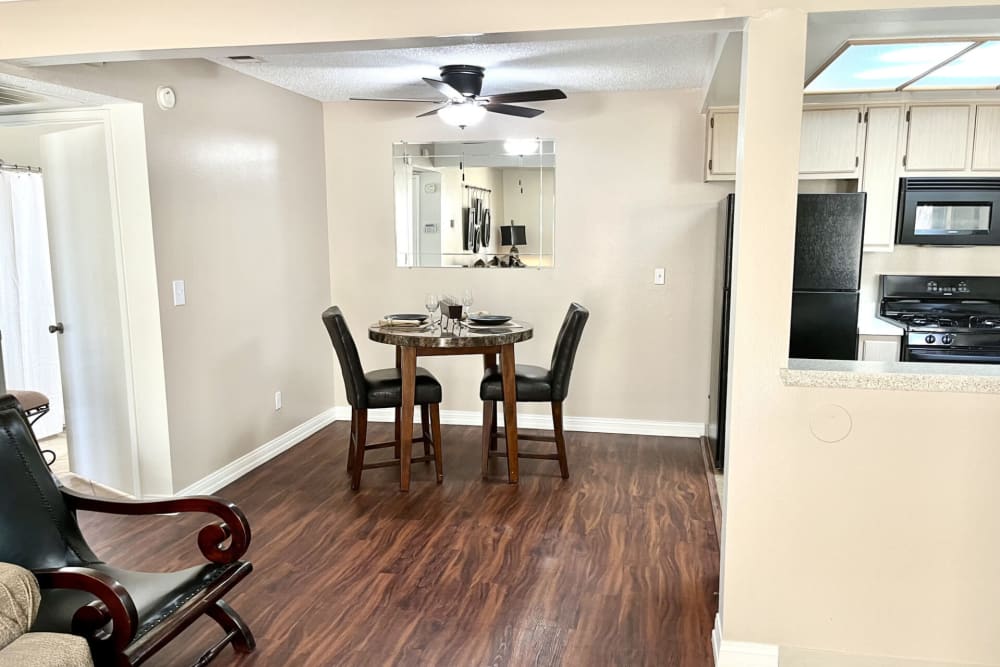 Dining table at Peppertree Place Apartments in Riverside, California
