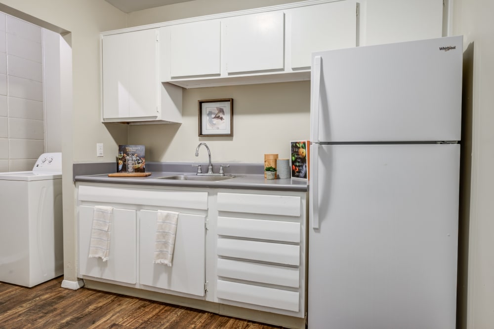 Kitchen with white appliance at The Summit at Ridgewood in Fort Wayne, Indiana
