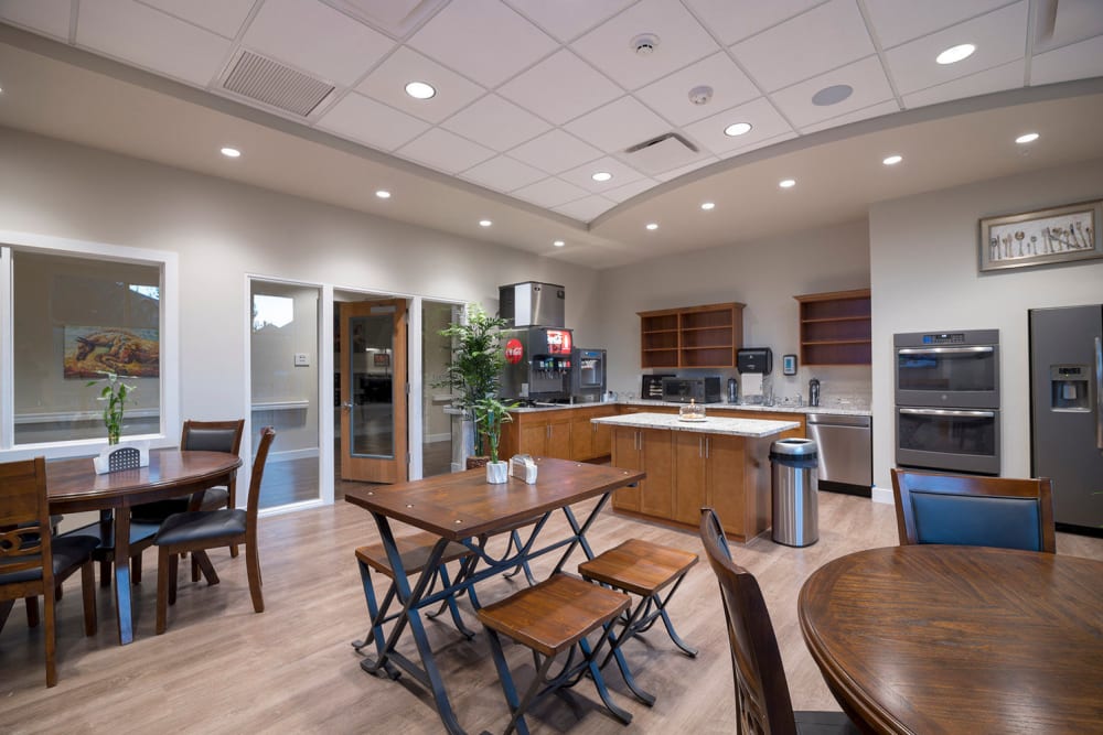 Cafe with a kitchen for residents at Crescent Senior Living in Sandy, Utah