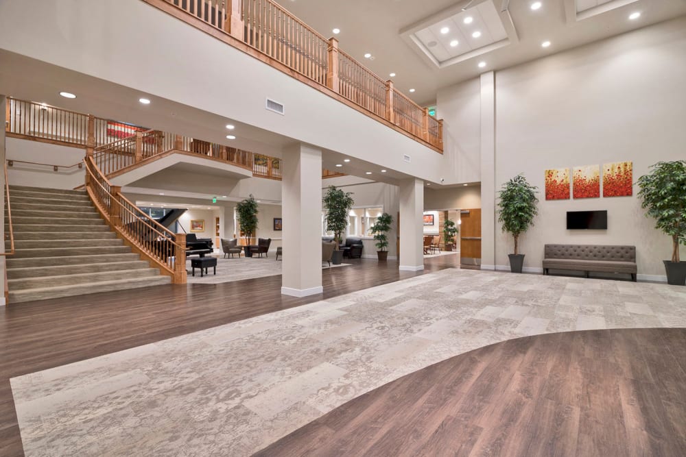 foyer area with stairs leading to the 2nd floor at Crescent Senior Living in Sandy, Utah