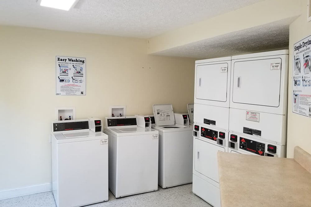Washers and dryers in the laundry facility at Chapel Creek in Doraville, Georgia