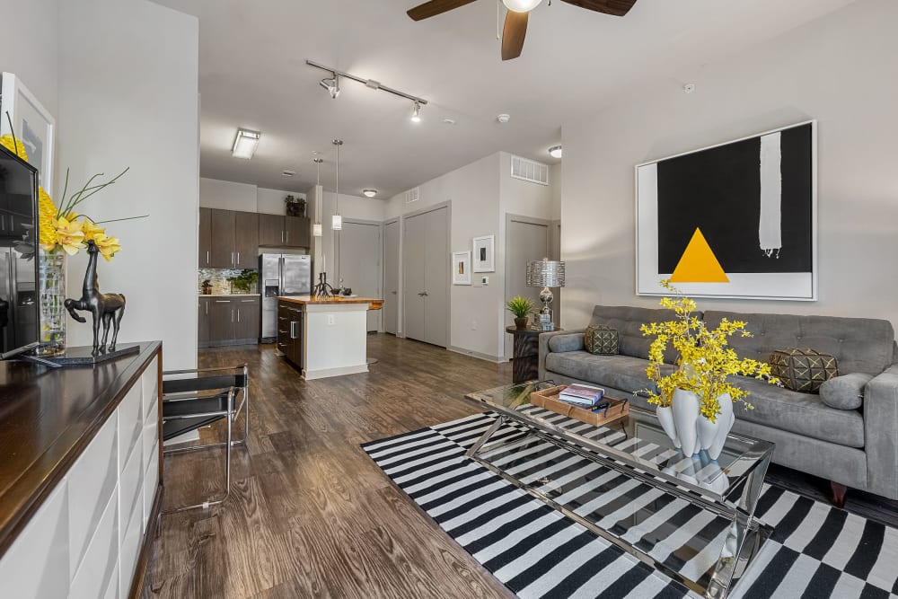 Bright and modern style living room with colorful décor at Marq Uptown in Austin, Texas