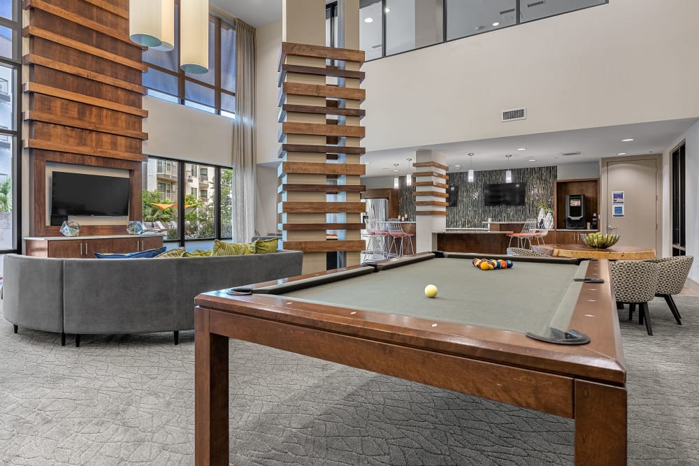 Pool table in game area of community clubhouse at Marq Uptown in Austin, Texas