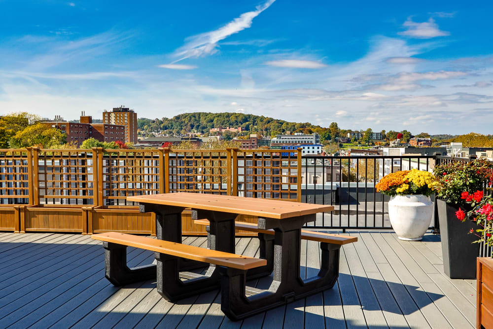 Rooftop terrace with picnic table at Five 10 Flats in Bethlehem, Pennsylvania