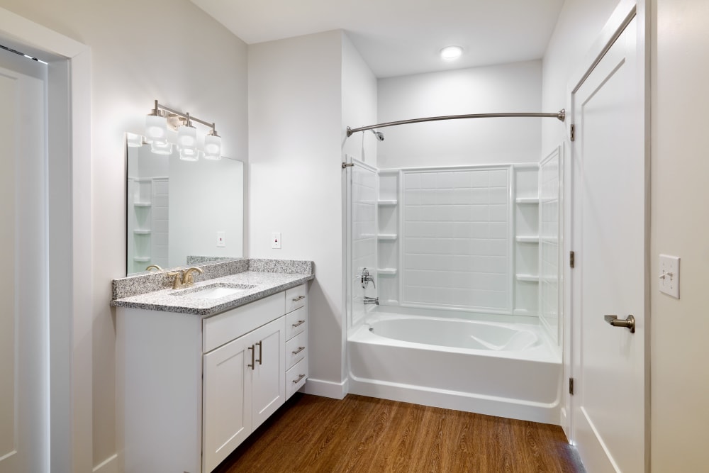 Large bathroom with tub and vanity in a model home at The Armory in Bethlehem, Pennsylvania