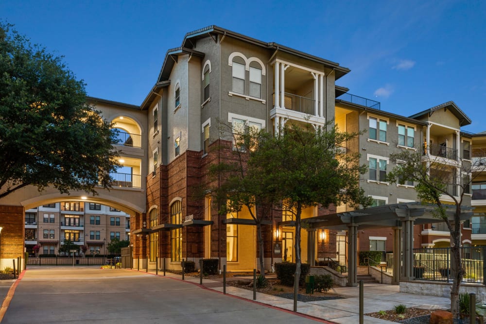 View of the entrance to our luxury community from across the street at Olympus Las Colinas in Irving, Texas