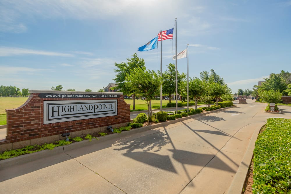 Signage and flags outside at Highland Pointe in Yukon, Oklahoma