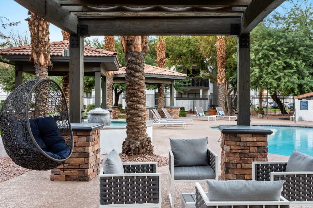 Deck with comfortable seating by the pool at Cielo on Gilbert in Mesa, Arizona