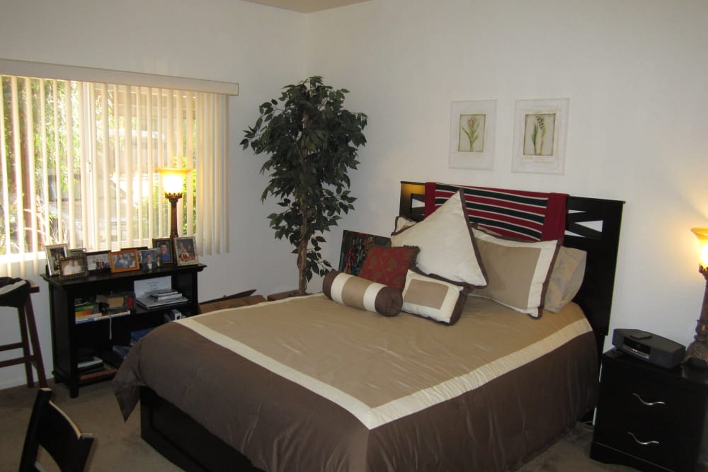 Model bedroom with soft carpet at Villas on the Green in Palm Desert, California