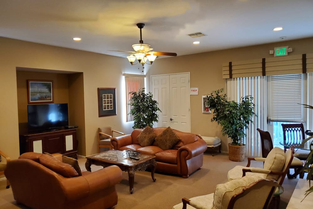Resident lounge community with TV at Villas on the Green in Palm Desert, California