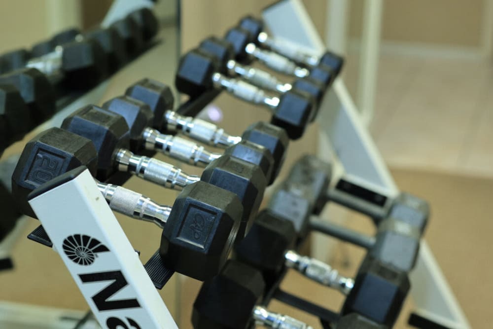 Cardio and weight lifting equipment in the fitness center at Villas on the Green in Palm Desert, California