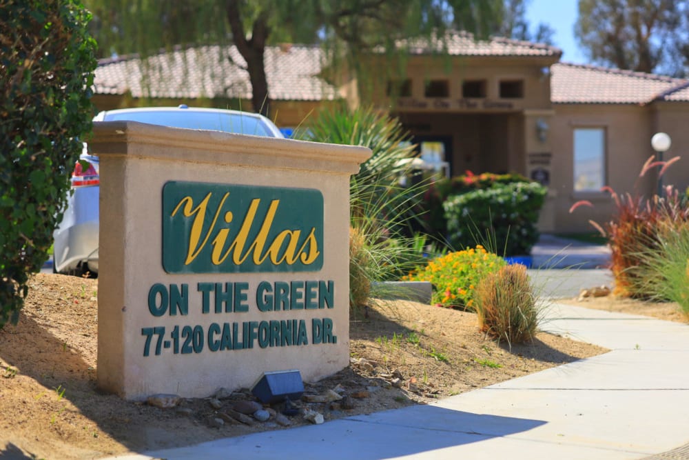 Exterior sign at Villas on the Green in Palm Desert, California