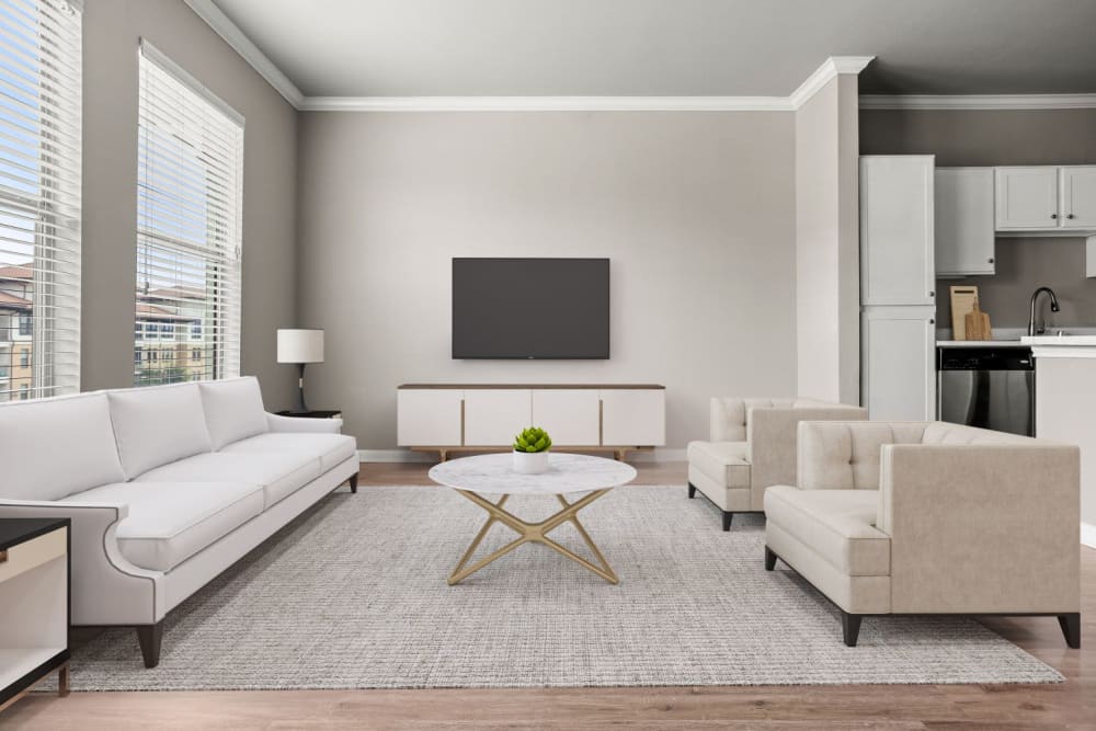 Living room with TV at Olympus Las Colinas in Irving, Texas