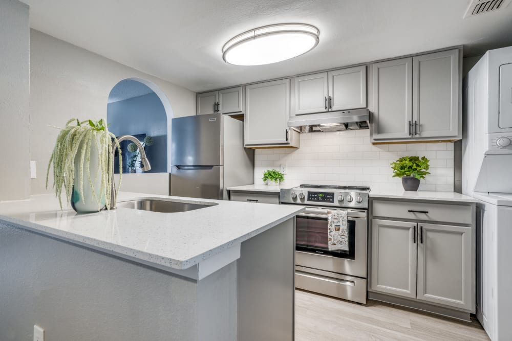 Kitchen in a model apartment at Mateo Apartment Homes in Arlington, Texas