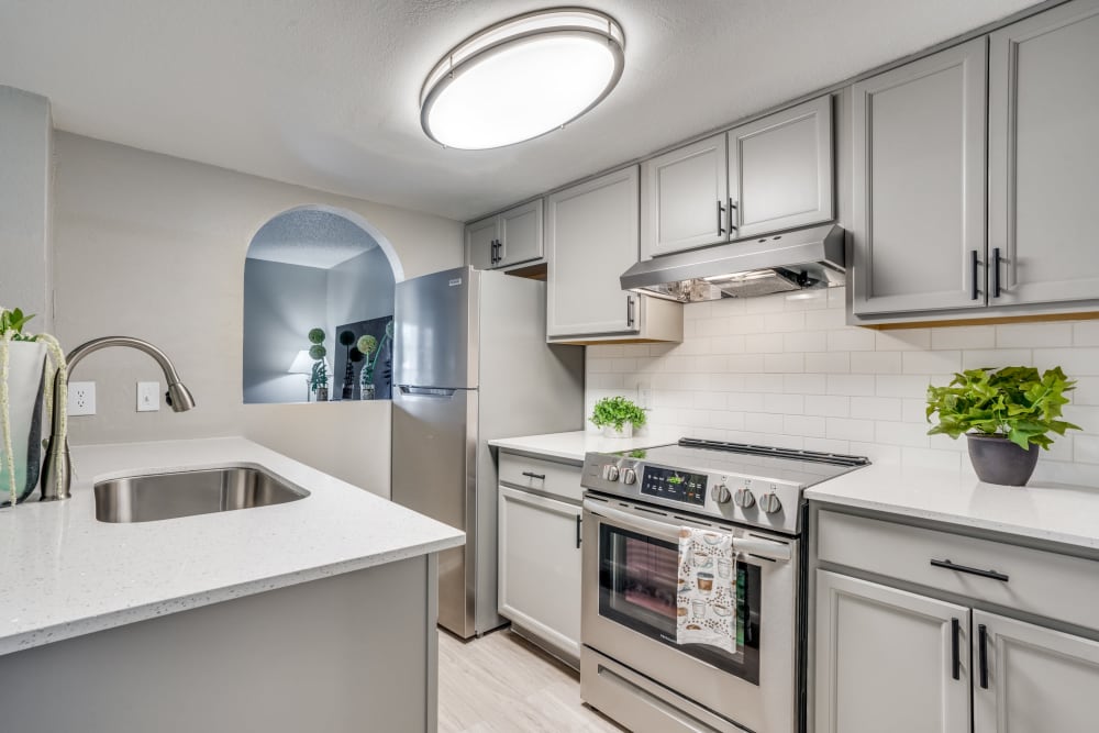 Kitchen with nice lighting at Mateo Apartment Homes in Arlington, Texas