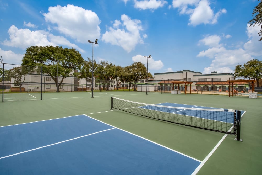 Modern tennis courts at Mateo Apartment Homes in Arlington, Texas
