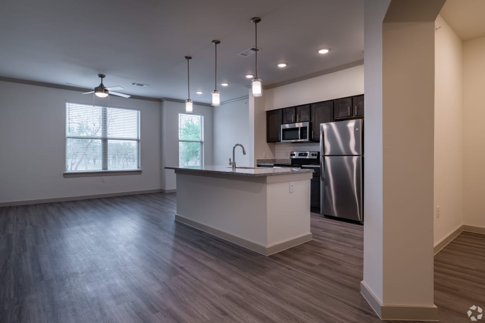 Living room and kitchen open at The Preserve at Willow Park in Willow Park, Texas