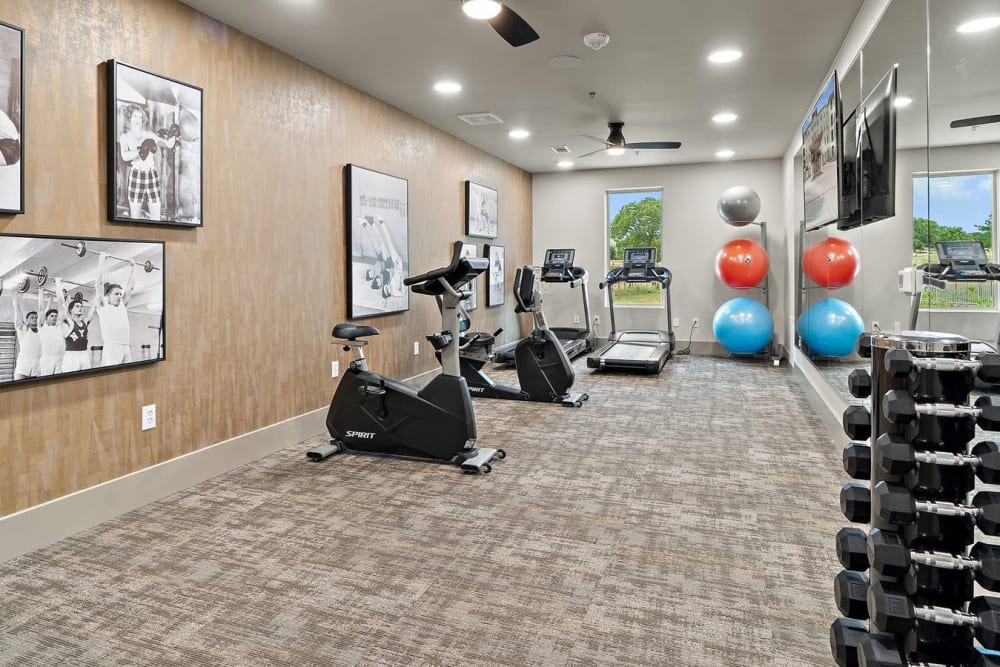 Fitness center with equipment at The Preserve at Willow Park in Willow Park, Texas