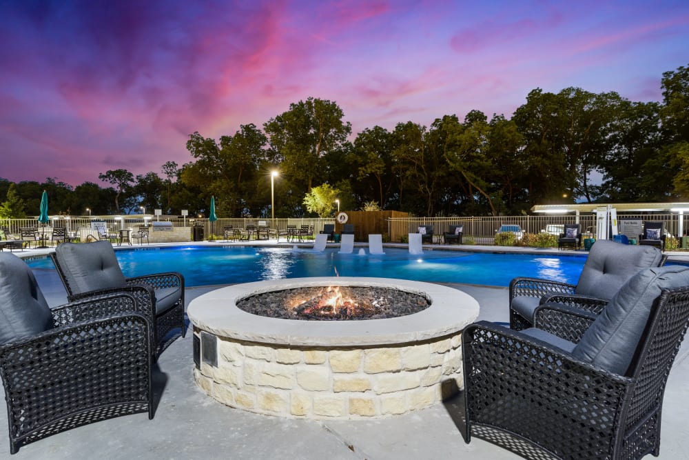 Firepit next to the pool at The Preserve at Willow Park in Willow Park, Texas