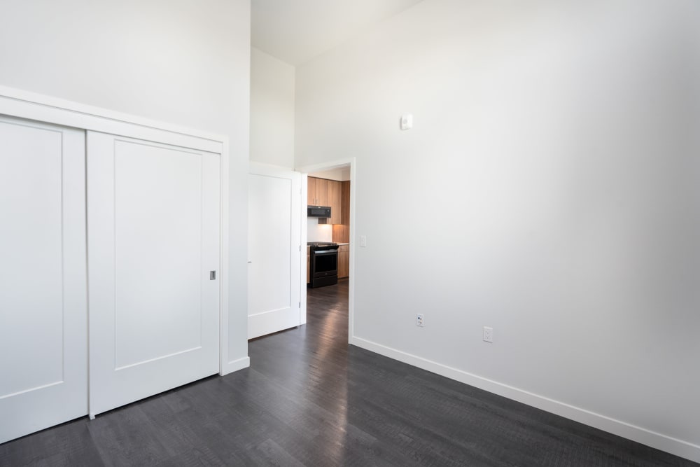 Bedroom with spacious walk-in closets in a penthouse at MV Apartments in Mountain View, California