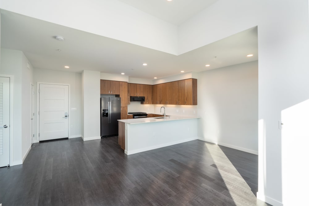Open living area and kitchen of a penthouse at MV Apartments in Mountain View, California