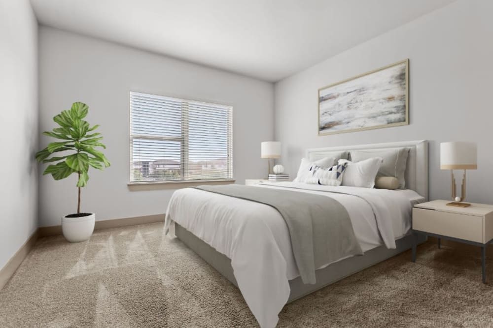 Modern furnishings in a model home's main bedroom at The Davis in Fort Worth, Texas