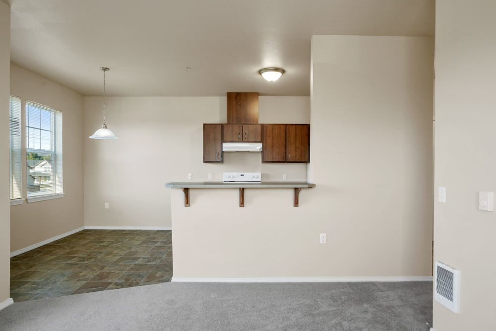 Apartment kitchen and dining room at Springbrook Ridge Apartments in Newberg, Oregon