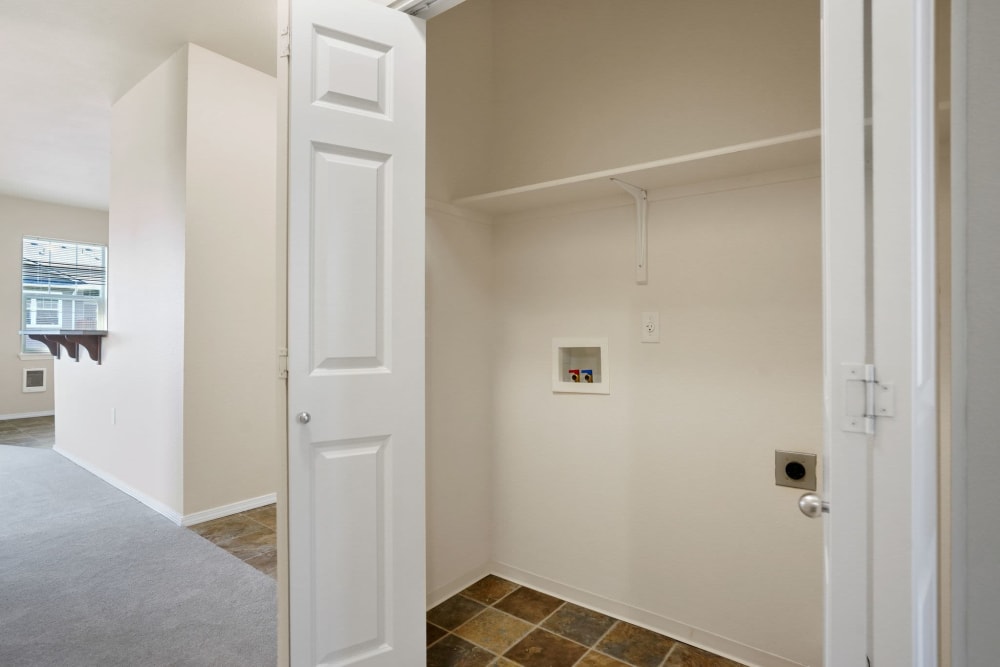 Double door hallway closet at Springbrook Ridge Apartments in Newberg, Oregon