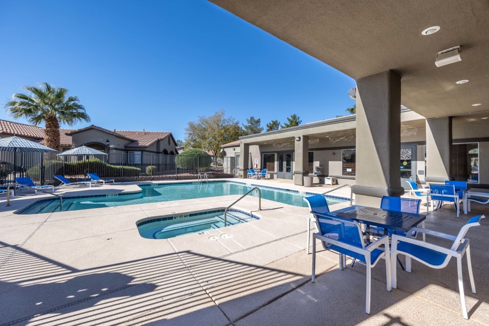 Community outdoor pool and spa at Whispering Palms Apartments in North Las Vegas, Nevada