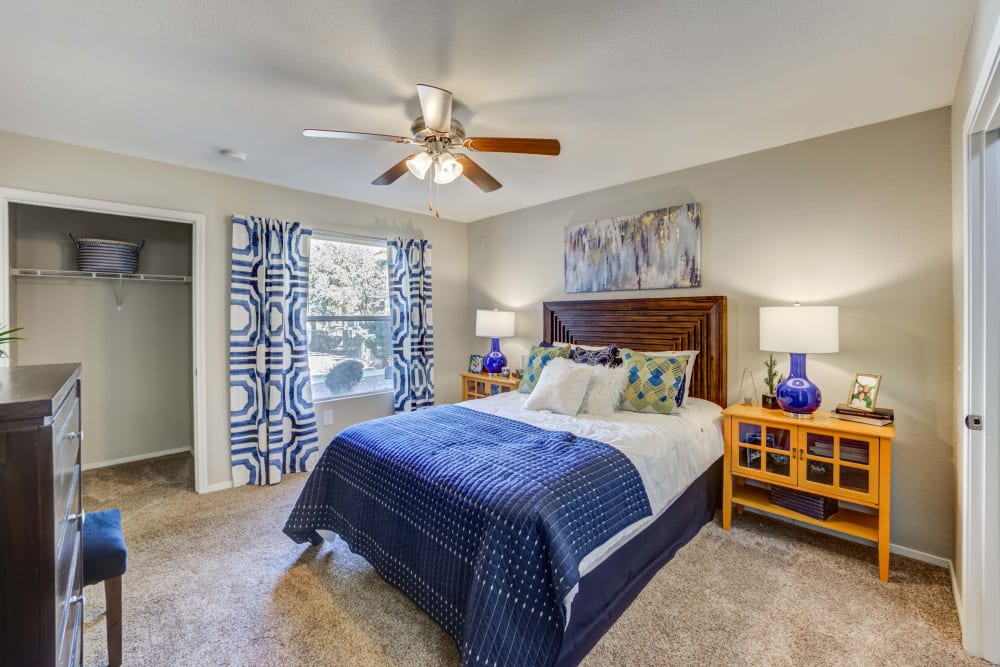 Bedroom with ceiling fan and large closet at Ascent at Silverado in Las Vegas, Nevada