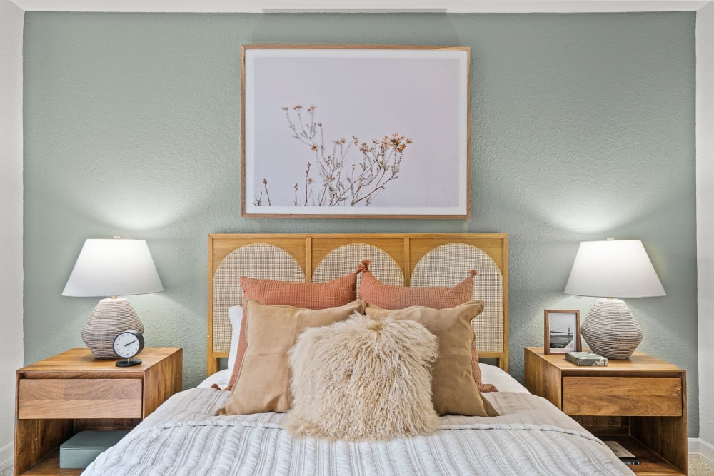 Modern and cozy bedroom in a model home at Timbers at Tualatin in Tualatin, Oregon