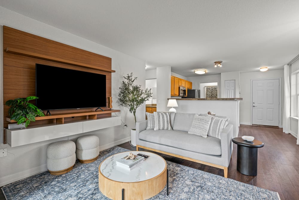 Spacious living room with large amounts of natural light at Timbers at Tualatin in Tualatin, Oregon