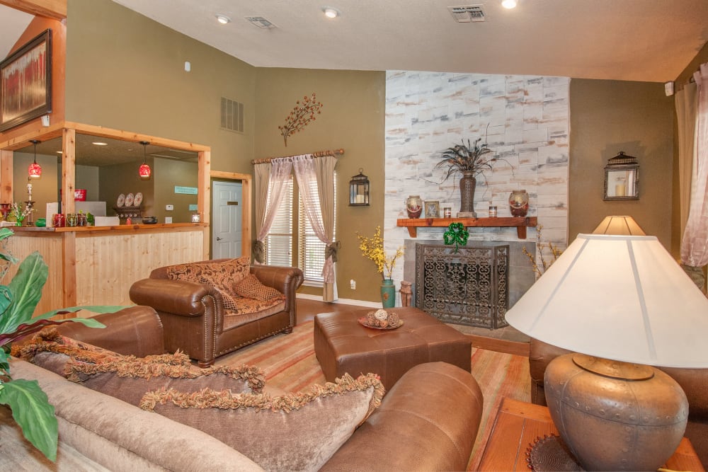 Community room with a fire place at Ashley Oaks in San Antonio, Texas