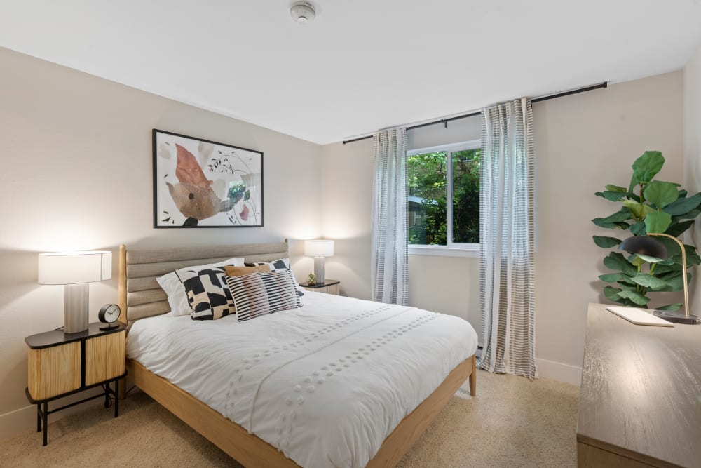 Spacious and modern bedroom in a model home at Skyline Redmond in Redmond, Washington