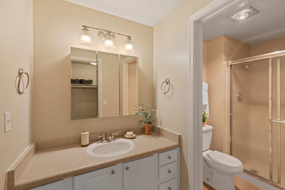 Large bathroom with standing shower at Skyline Redmond in Redmond, Washington