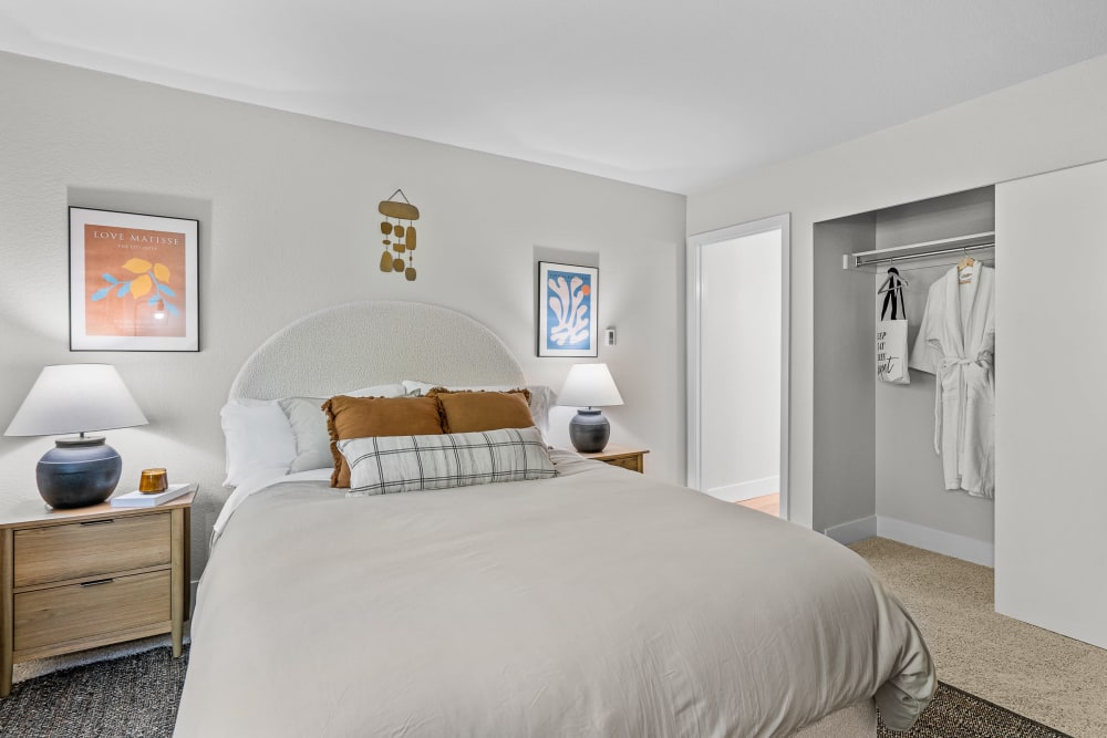Large comfortable bedroom in a model home at Haven at Golf Creek in Portland, Oregon