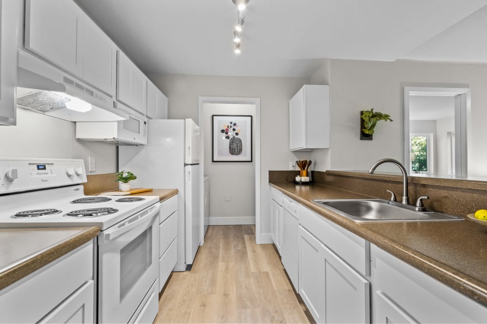 Spacious and modern kitchen with updated appliances at Haven at Golf Creek in Portland, Oregon