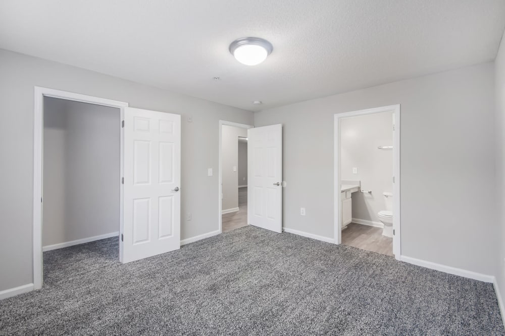 Carpeted room in a model home at Creekside in Doraville, Georgia