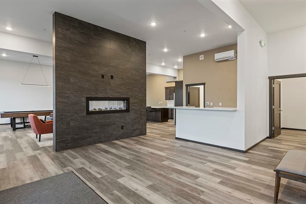 Model clubhouse with hardwood floors at Wyndstone Apartments in Yelm, Washington