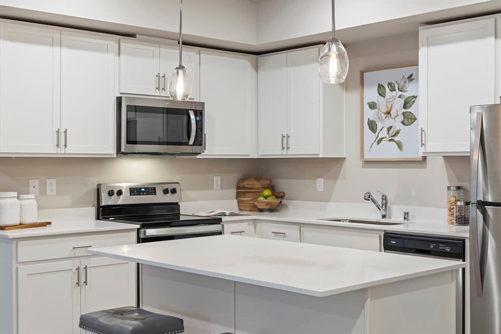Modern chef-inspired kitchen at Wyndstone Apartments in Yelm, Washington