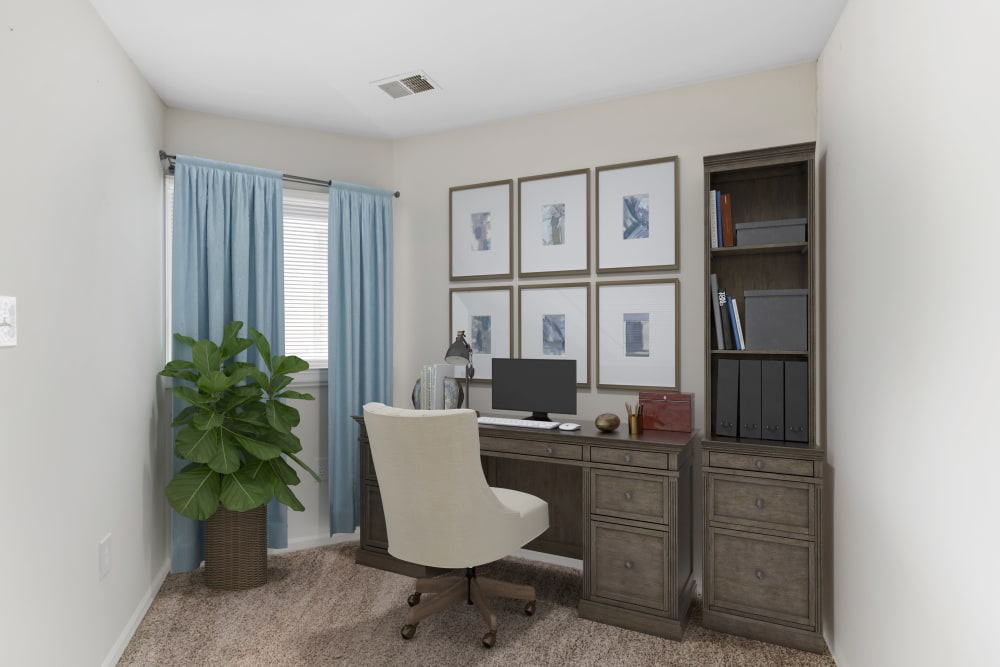 Den staged as home office at Seagrass Cove Apartment Homes in Pleasantville, New Jersey