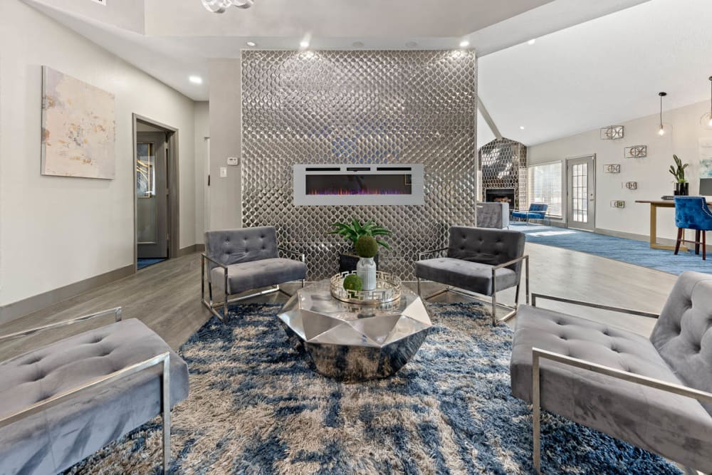 Clubroom with Fireplace at Ronan Apartment Homes in Grand Prairie, Texas
