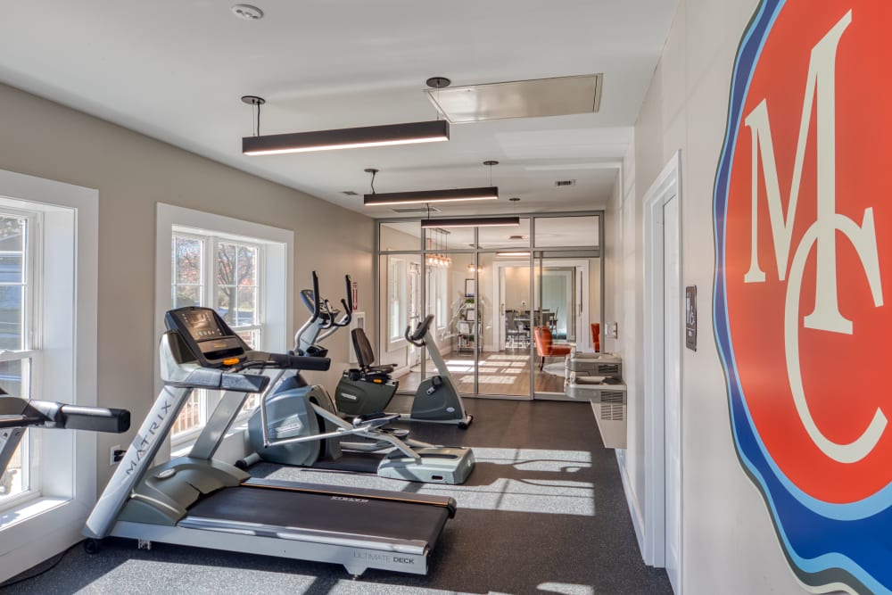 Treadmills and ellipticals in the fitness center at Millspring Commons in Richmond, Virginia
