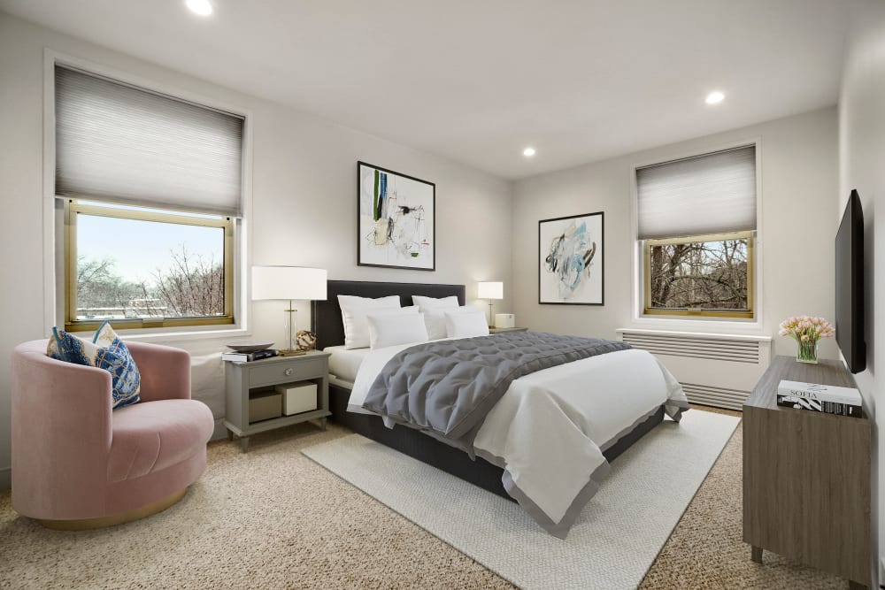 Two bedroom master bedroom with plush carpeting at Camelot Court in Brighton, Massachusetts