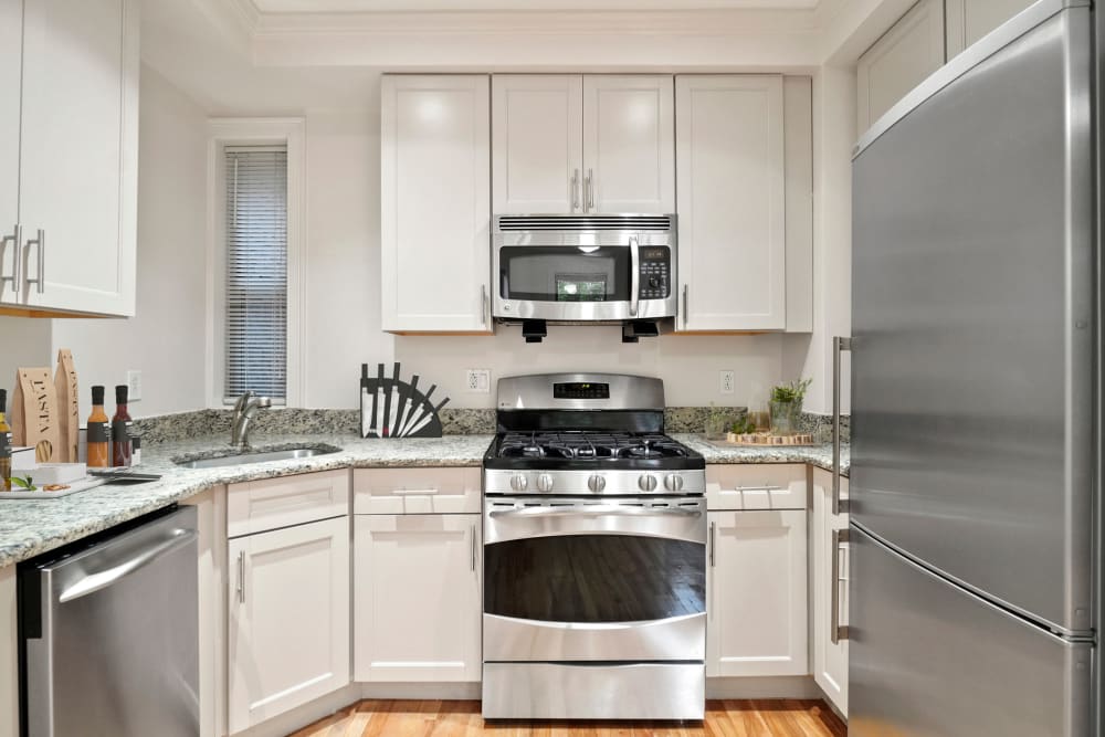Kitchen with modern appliances at Atrio Boston in Boston, Massachusetts