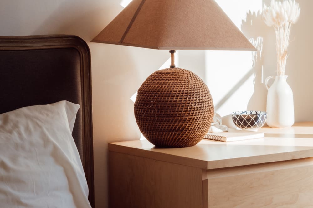 Trendy wooden light on bedside table at Shaff Square Apartments in Stayton, Oregon