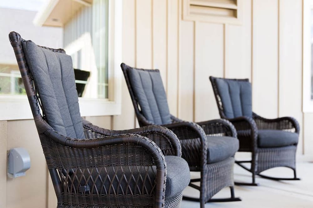 Rocking chairs on porch at Greenfield Estates in Akron, Ohio