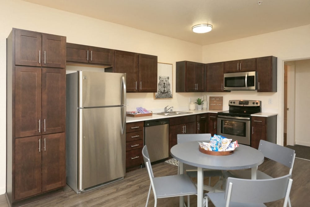 Kitchen with stainless-steel appliances at Cedar Flats in Chico, California