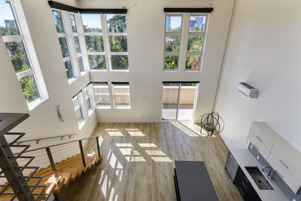 View of the living space from the second floor at 16 Powerhouse Apartments in Sacramento, California